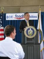 Secretary Chu and John Berry (foreground) at the Department of Energy Feds Feed Families Event.