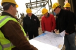 Supervising Engineer for Public Service Electric and Gas Company, Michael Vincent, right, Department of Energy Secretary Steven Chu, center, and FEMA Deputy Administrator Rich Serino review power restoration at the Hoboken electrical substation. Restoration of power to communities impacted by Hurricane Sandy remains a high priority. | Photo by Jocelyn Augustino/FEMA.