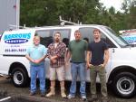 Smart grid technology installations provided not only new work, but new customers for Narrows Electric owner Gary Miklethun, far l., and his team, from l. to r., Ken Dehart, Rodney Thomas and Dave Brosie.