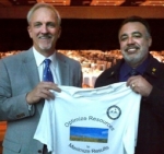 EM Carlsbad Field Office (CBFO) Manager Joe Franco, right, presents a memento to EM Senior Advisor Dave Huizenga