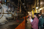 Sandina Ponte, a member of the University of Missouri's Industrial Assessment Center, inspects equipment at a manufacturing facility during an energy audit. | Photo courtesy of University of Missouri IAC.