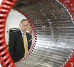 Department of Energy Secretary Steven Chu visited Ingeteam, based in Milwaukee, Wisconsin, on Thursday, July 12. During the visit, he toured the facilities that produce wind power generators and converters, in addition to PV solar inverters. In this photo he looks at a Stator 2MW Wind Turbine Generator. | Photo by Pat A. Robinson