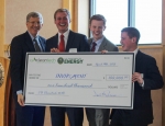 Acting Energy Secretary Poneman (far left) stand with a team of young entrepreneurs from Brigham Young University -- the regional winners of the National Clean Energy Business Plan Competition. | Photo by Ilya Pupko, ILAsoft.net.