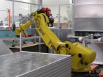 A robot works on crystalline solar cells at Wisconsin-based Helios USA, LLC. The opening of the manufacturing plant has supported 26 jobs and is projected to create a total of 50 permanent jobs in the state and was supported through a State Energy Program loan. | Courtesy of Helios USA, LLC.