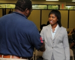 Karl Fraiser, a member of the Savannah River Special Emphasis Planning Committee, meets with Dot Harris at the site’s Women’s Equality Day Celebration. | Photo by Rob Davis, Savannah River Site.
