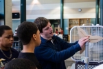 The <a href="http://www.windpoweringamerica.gov/windcompetition">Collegiate Wind Competition</a> is one of several Energy Department-supported programs aiming to inspire the next generation of clean energy leaders. Here, JMU student Greg Miller demonstrates how the blades of a wind turbine work as part the Wind for Schools project. | Photo courtesy of the Virginia Center for Wind Energy. 