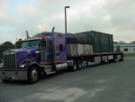 A truck carries a waste shipment from Brookhaven National Laboratory in New York. EM completed legacy cleanup activities at the site last year.
