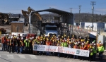 Employees with the K-25 demolition team gather for a photo following the completion of demolition of the north end of the K-25 Building today.