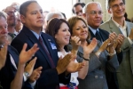 From left, EM Deputy Assistant Secretary for Waste Management Frank Marcinowski, San Ildefonso Pueblo Governor Terry Aguilar, Los Alamos County Council Chair Sharon Stover, New Mexico Governor Susana Martinez, Los Alamos Site Office Manager Kevin Smith, and Laboratory Director Charles McMillan applaud as the 1,000th shipment of waste leaves Los Alamos National Laboratory.