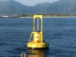 This experimental power-generating buoy installed off the coast of Oahu can produce enough energy to power 25 homes under optimal conditions. | Photo courtesy of Ocean Power Technologies, Inc.