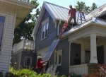Milwaukee solar installers putting in a rooftop solar energy system on Dr. Paula Papanek's home. | Photo courtesy of Dr. Paula Papanek. 