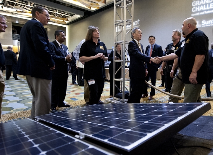 Energy Secretary Steven Chu meets with students from Front Range Community College at the Solar Instructor Training Network exhibit at the SunShot Grand Challenge Summit and Technology Forum in Colorado. | Photo by Dennis Schroeder, NREL. Energy Secretary Steven Chu meets with students from Front Range Community College at the Solar Instructor Training Network exhibit at the SunShot Grand Challenge Summit and Technology Forum in Colorado. | Photo by Dennis Schroeder, NREL.